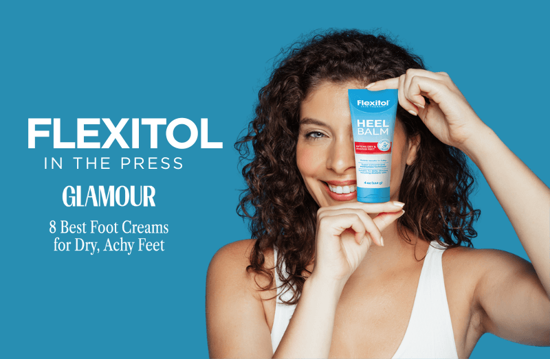 Promotional graphic with text highlighting Flexitol’s feature in Glamour magazine as one of the “8 Best Foot Creams for Dry, Achy Feet,” against a blue background with a person holding a rectangular card.